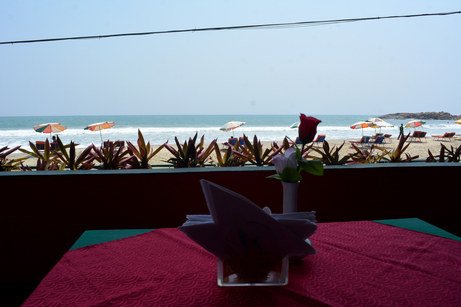 View of sea beach from a seaside restaurant