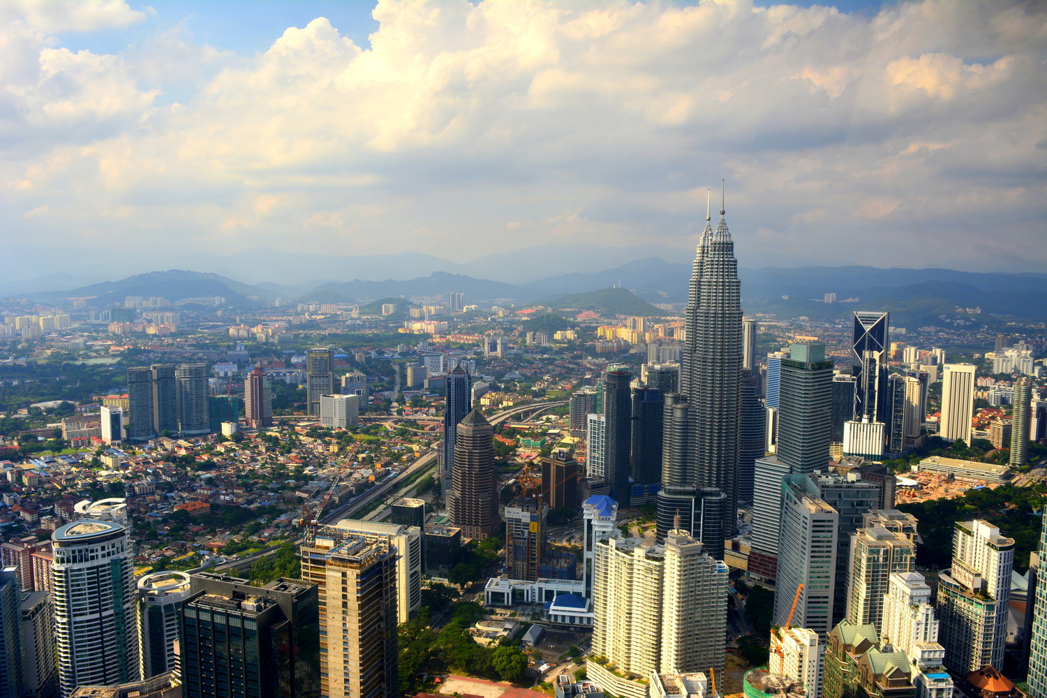 Petronas Twin Towers and other tall buildings as seen from Atmosphere 360, a revolving restaurant situated 282 metres (948 feet) above the ground level