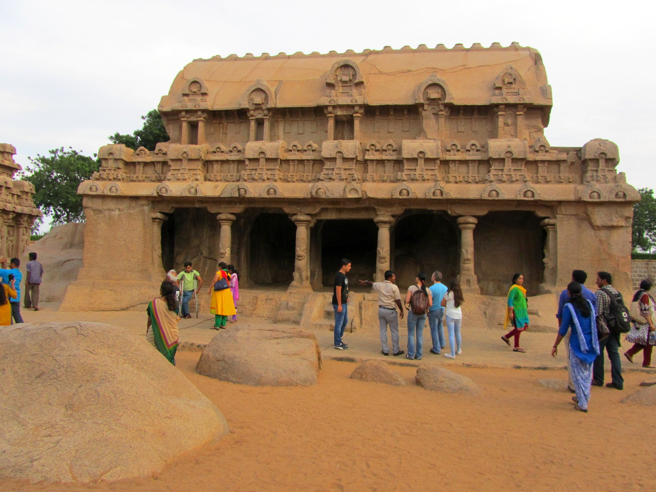 A monolithic granite monument known as Bhima Ratha with lion mounted columned gallery